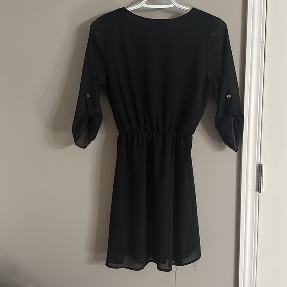 Eclipse size small black dress with sheer sleeves and button detail - Picture 2 of 3